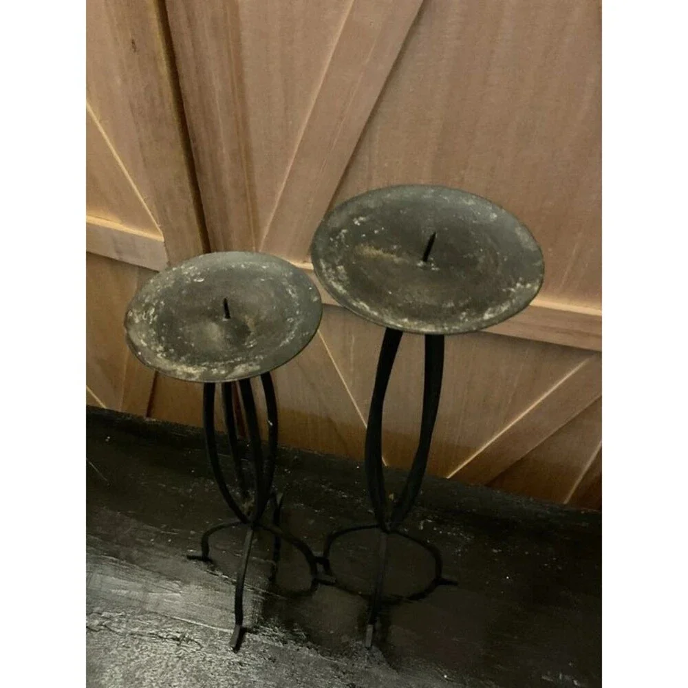 Set of black metal candle holders